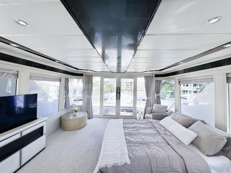 Slide: The Image of Luxurious bedroom interior of 2010 Custom WHS Marine yacht with large windows and modern decor. - 33