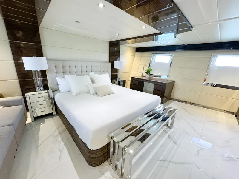 Slide: The Image of Luxurious bedroom in a 2010 Custom WHS Marine yacht with modern decor and elegant furnishings. - 35