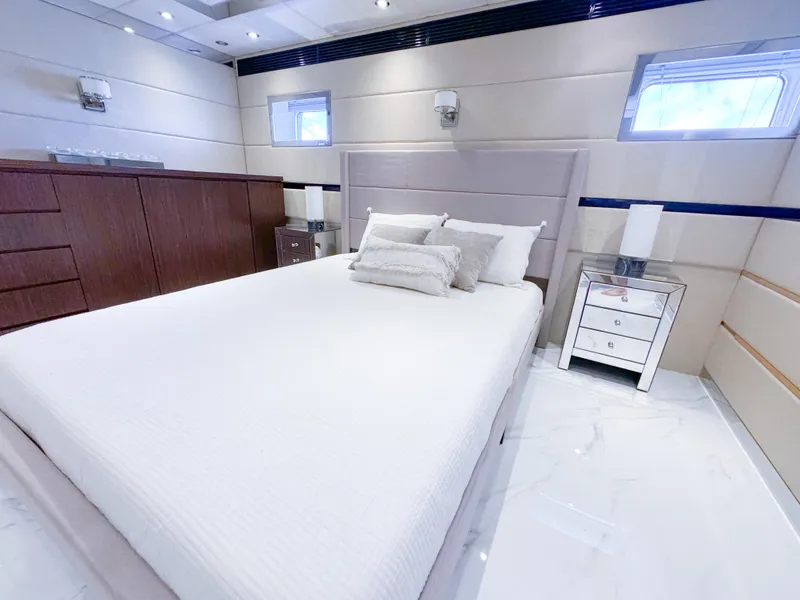 Slide: The Image of Luxurious bedroom on a 2010 Custom WHS Marine yacht with modern decor. - 37