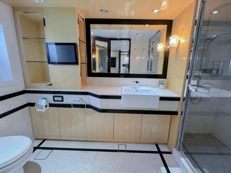 Slide: The Image of Modern bathroom in a 2010 Custom WHS Marine yacht with sleek fixtures and large mirror. - 40