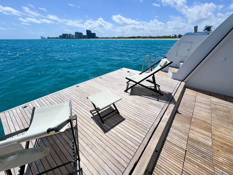 Slide: The Image of Luxury yacht deck with lounge chairs overlooking the ocean, Custom WHS Marine 2010. - 44