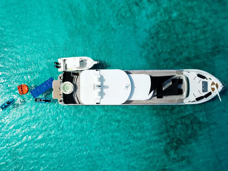 Slide: The Image of Aerial view of 2010 Custom WHS Marine yacht on turquoise water. - 9