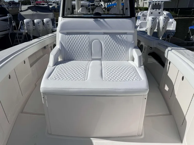 Slide: The Image of Luxurious seating on the 2024 Solace 37 CS boat, featuring diamond-stitched upholstery. - 12