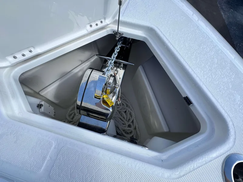 Slide: The Image of Anchor storage compartment of 2024 Solace 37 CS boat with chain and rope. - 17
