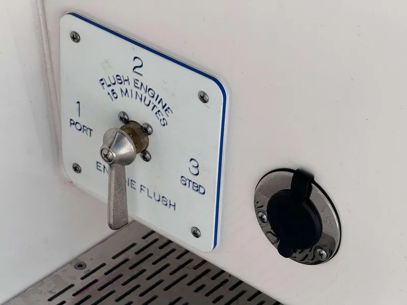 Slide: The Image of Engine flush control panel on a 2024 Solace 37 CS boat. - 22