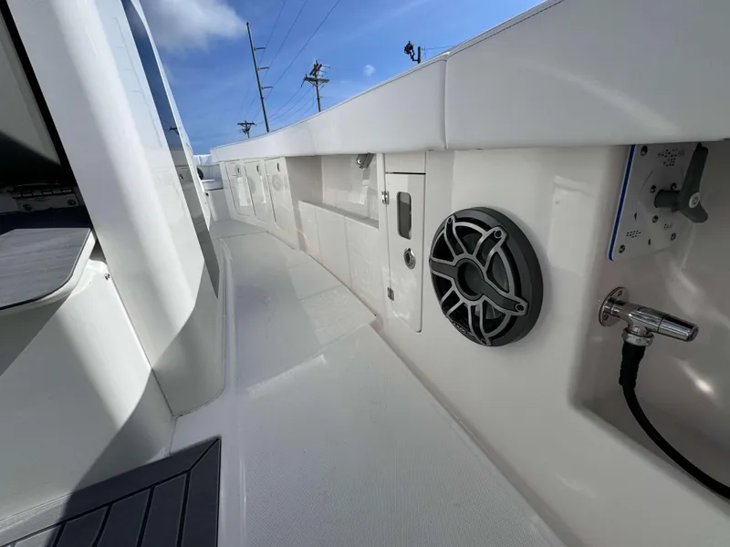 Slide: The Image of 2024 Solace 37 CS boat deck with speaker and control panel. - 32