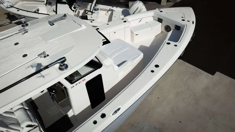 Slide: The Image of 2024 Solace 37 CS boat, top view of deck and seating area. - 36