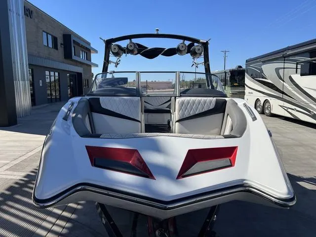 Slide: The Image of 2014 Tigé RZ4 boat with stylish seating and wakeboard tower. - 5