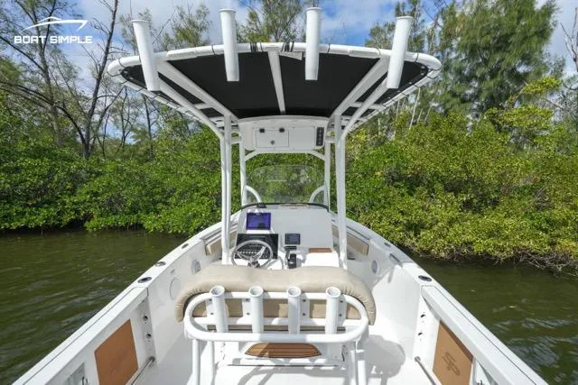 Slide: The Image of 2023 Sea Pro 219 Deep V CC boat interior with console and seating. - 4