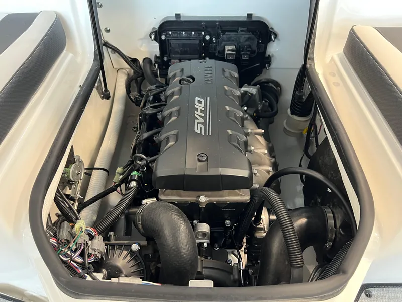 Slide: The Image of 2024 Yamaha Boats AR 195 engine compartment showcasing powerful engine components. - 10