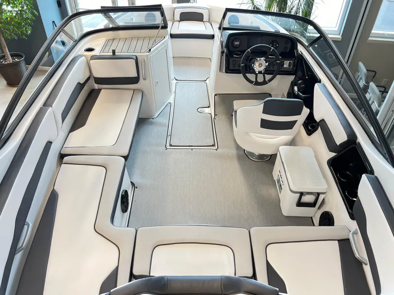 Slide: The Image of 2024 Yamaha Boats AR 195 interior with sleek seating and modern dashboard design. - 4