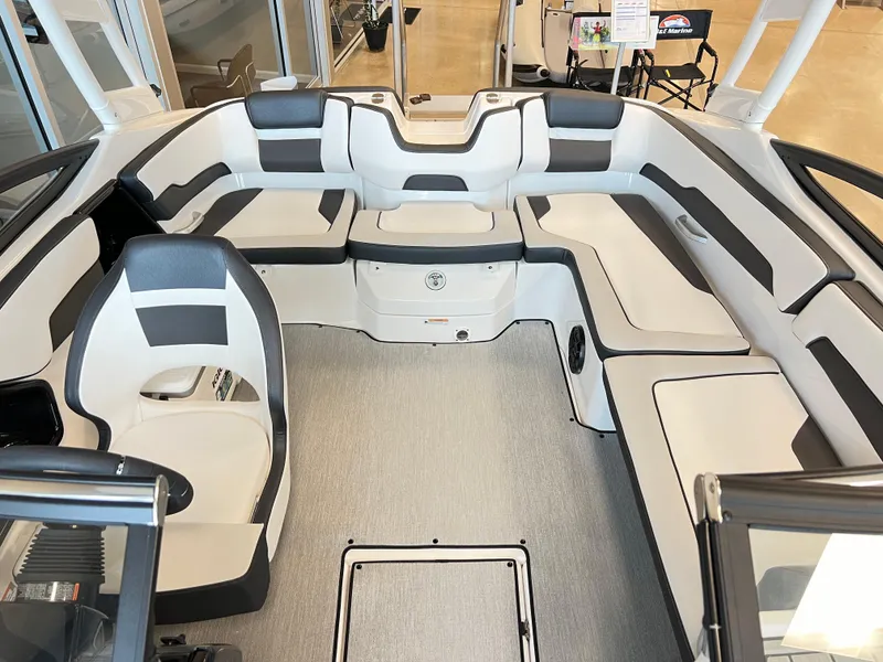 Slide: The Image of 2024 Yamaha Boats AR 195 interior with spacious seating and modern design. - 5