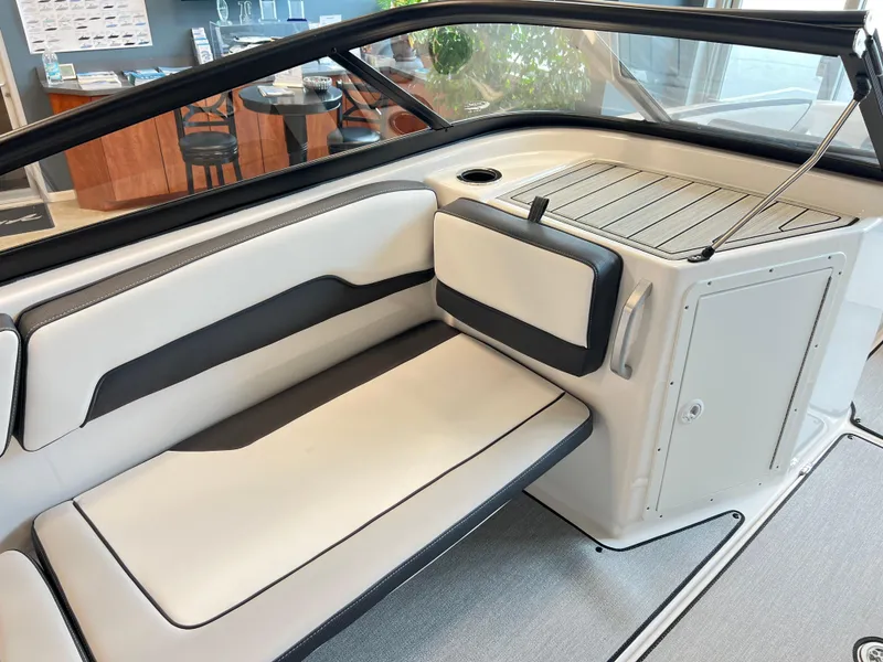Slide: The Image of 2024 Yamaha Boats AR 195 interior seating with sleek design and modern features. - 9
