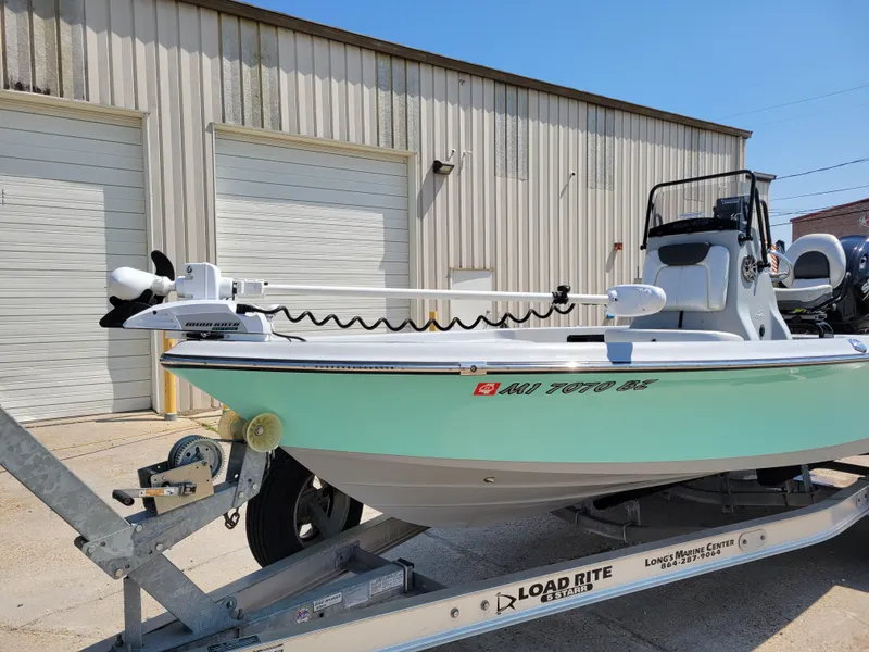 Slide: The Image of 2017 Blue Wave 2200 PureBay boat on Load Rite trailer outside a warehouse. - 10