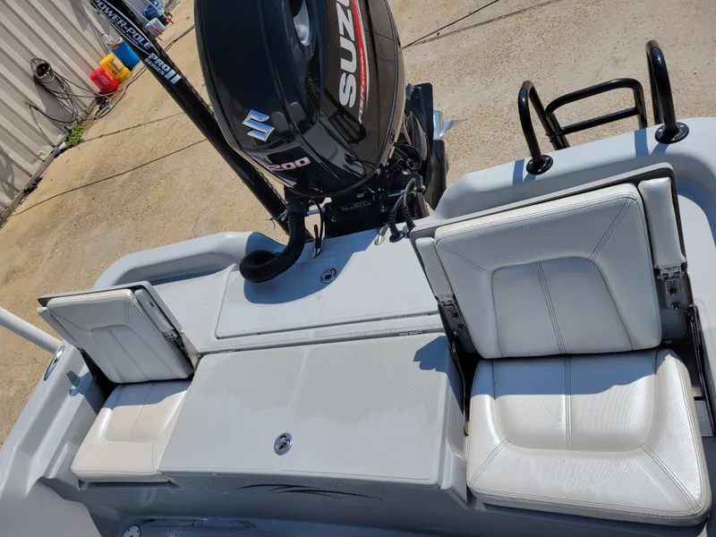 Slide: The Image of 2017 Blue Wave 2200 PureBay boat with Suzuki engine and white seating. - 14