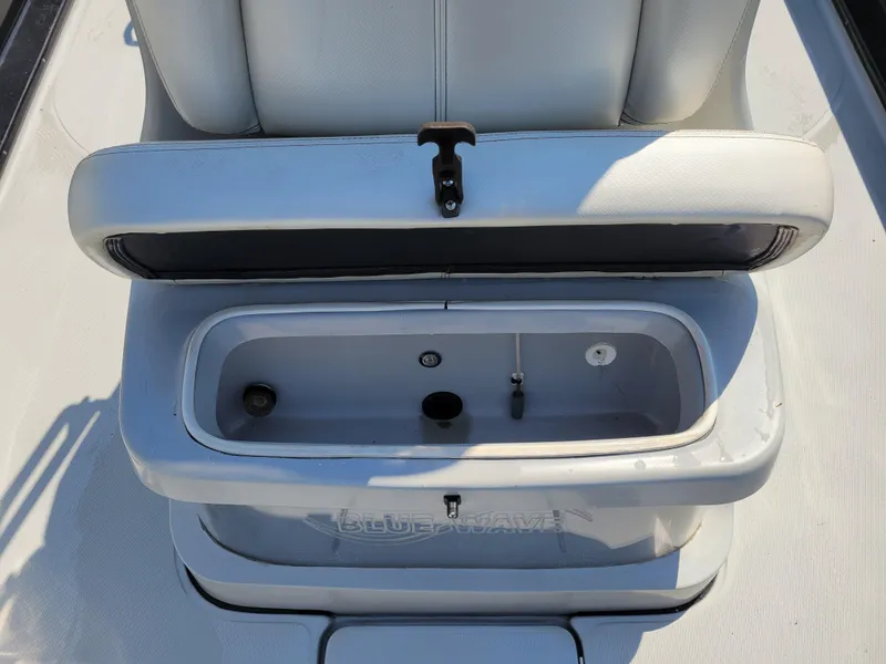 Slide: The Image of 2017 Blue Wave 2200 PureBay boat seat with built-in storage compartment. - 21