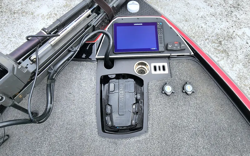Slide: The Image of 2024 Ranger Z520R boat dashboard with navigation system and controls. - 3