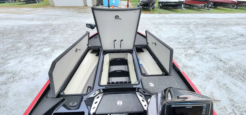 Slide: The Image of 2024 Ranger Z520R boat with open storage compartments, showcasing spacious interior design. - 7
