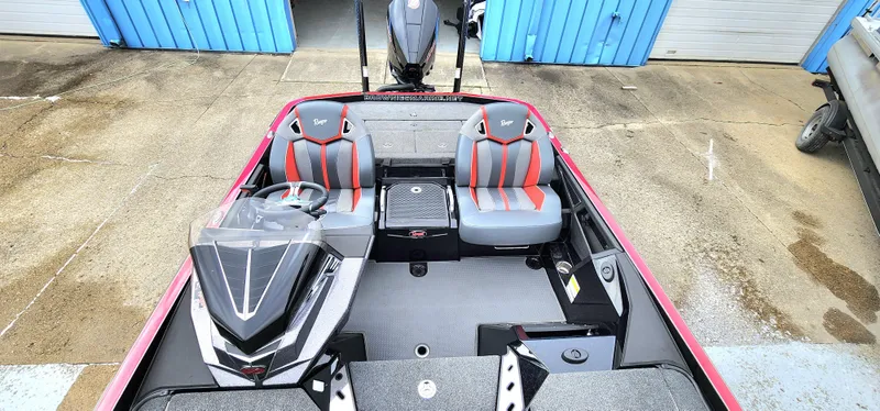 Slide: The Image of 2024 Ranger Z520R boat interior with dual seats and modern dashboard. - 8