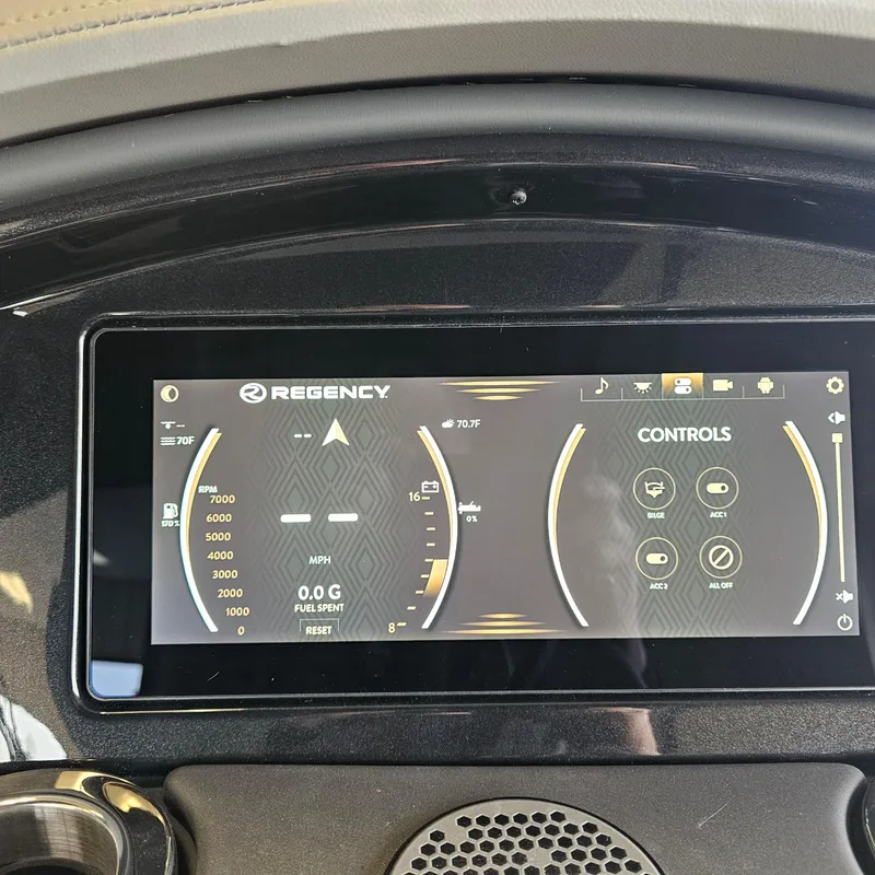 Slide: The Image of 2024 Regency 250 LE3 Sport dashboard display showing controls and gauges. - 18