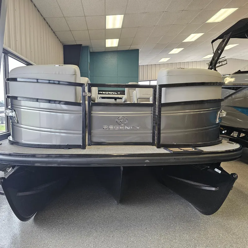 Slide: The Image of 2024 Regency 250 LE3 Sport pontoon boat in showroom. - 4