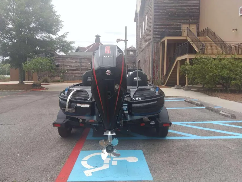Slide: The Image of 2024 Nitro Z20 Pro boat parked in a handicapped parking space. - 2