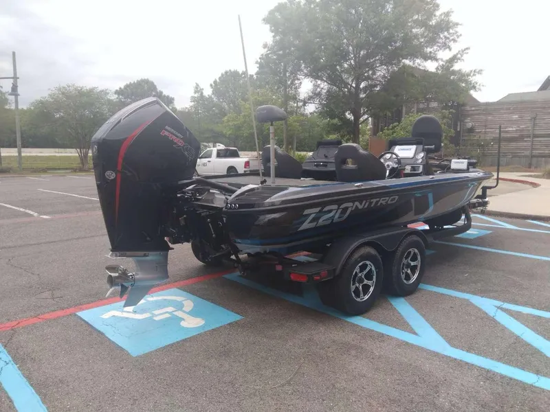Slide: The Image of 2024 Nitro Z20 Pro boat parked in a handicap spot. - 3
