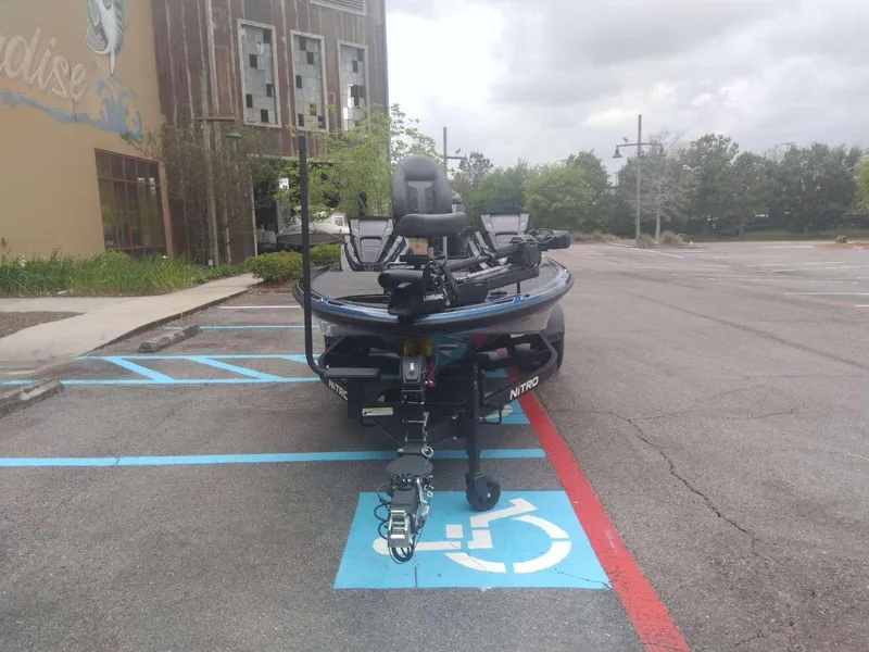 Slide: The Image of 2024 Nitro Z20 Pro boat parked in a handicapped parking space. - 6