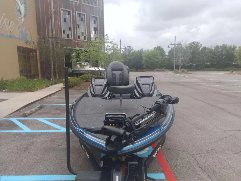 Slide: The Image of 2024 Nitro Z20 Pro fishing boat in parking lot. - 7