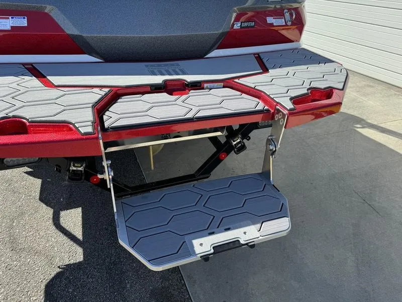 Slide: The Image of 2024 MasterCraft NXT 22 boat with foldable swim platform and step ladder. - 8