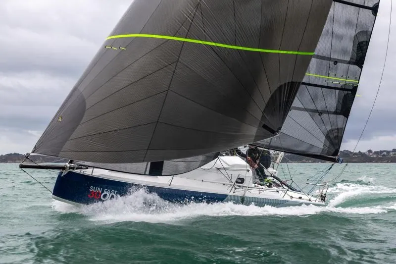 The Image of 2024 Jeanneau Sun Fast 30 One Design sailboat navigating choppy waters. - 0