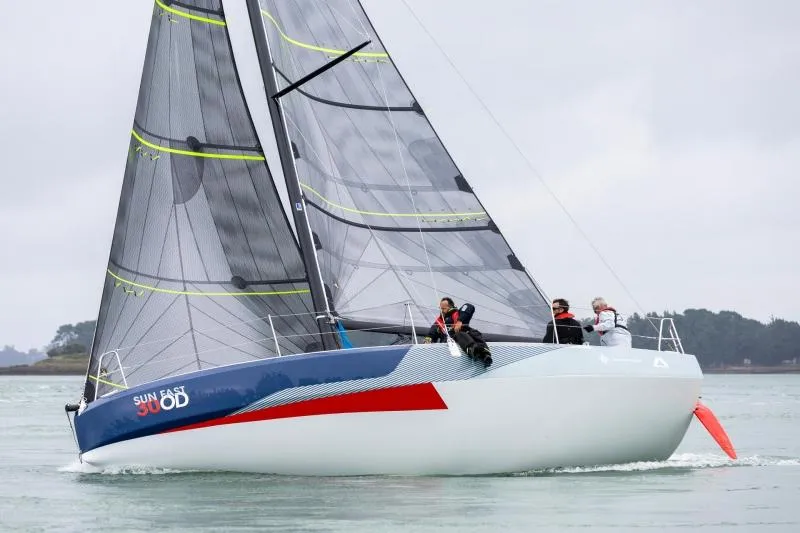 Slide: The Image of 2024 Jeanneau Sun Fast 30 One Design sailboat on water, featuring sleek design and modern sails. - 14