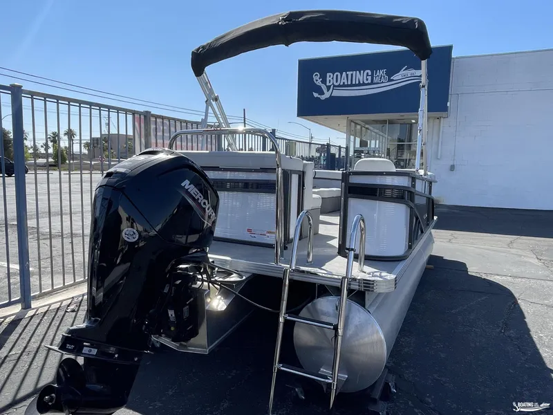 Slide: The Image of 2023 Crest 200 LX L Classic pontoon boat with Mercury outboard motor at Boating Lake Mead. - 2