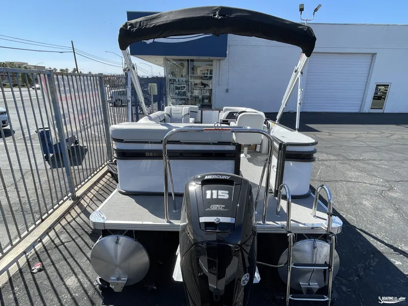 Slide: The Image of 2023 Crest 200 LX L Classic pontoon boat with Mercury 115 outboard motor. - 3