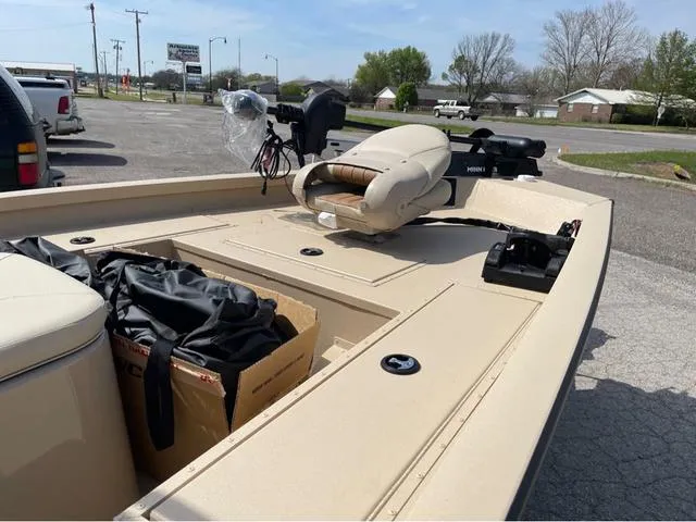 Slide: The Image of 2024 G3 Bay 18 GX boat with seating and storage compartments. - 10