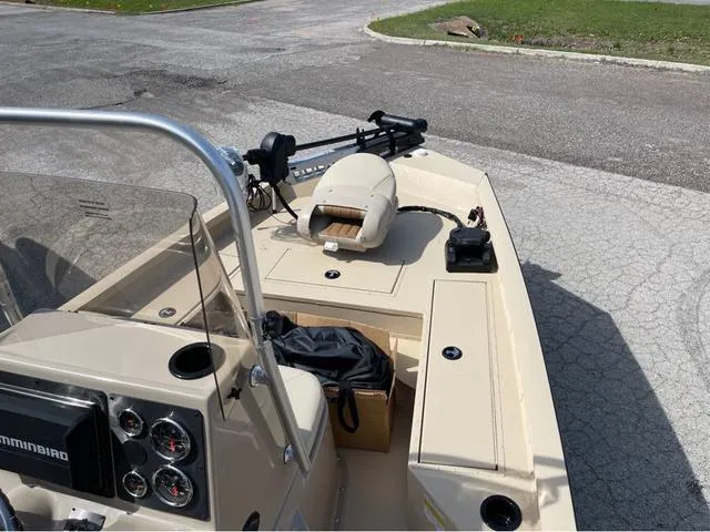 Slide: The Image of 2024 G3 Bay 18 GX boat interior with control panel and seating. - 12