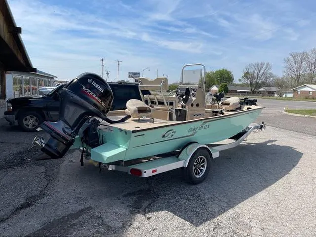 Slide: The Image of 2024 G3 Bay 18 GX boat with Yamaha outboard motor on a trailer. - 3
