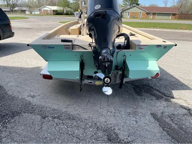Slide: The Image of 2024 G3 Bay 18 GX boat rear view with outboard motor. - 5
