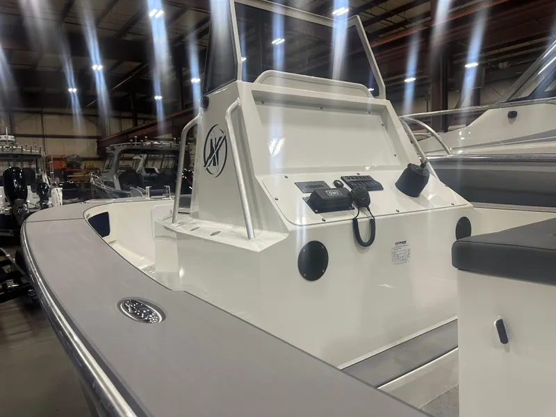 Slide: The Image of Gunnel and Center Console on Extreme Boats 645 CC  - 15