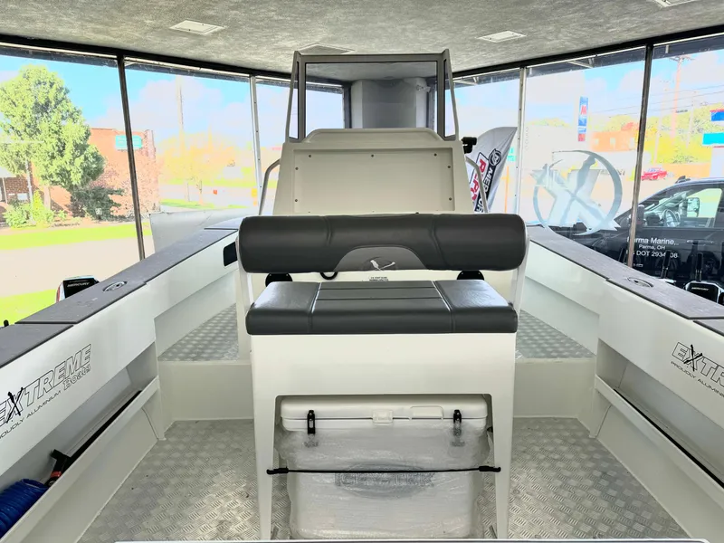 Slide: The Image of Plate flowring on the Extreme Boats 645 Center Console - 2