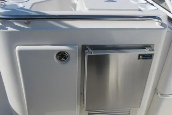 Slide: The Image of 2004 Silverton 330 Sport Bridge yacht with stainless steel refrigerator. - 26