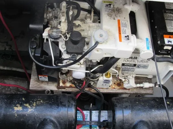 Slide: The Image of Engine compartment of a 2004 Silverton 330 Sport Bridge boat. - 29