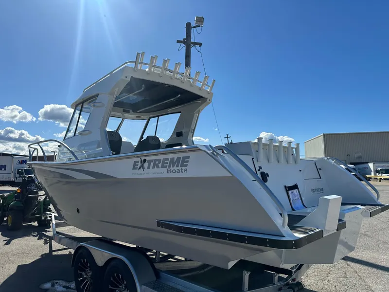 Slide: The Image of 2024 Extreme Boats 795 Walk Around 26' for Sale by Parma Marine Port Side View - 2