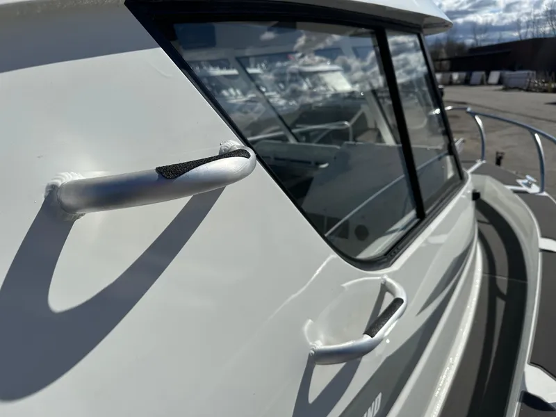 Slide: The Image of Pillar Steps on the 2024 Extreme Boats 795 Walk Around 26' for Sale by Parma Marine - 4