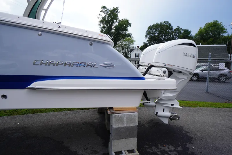 Slide: The Image of 2025 Chaparral 280 OSX boat with Yamaha outboard motor on display. - 11