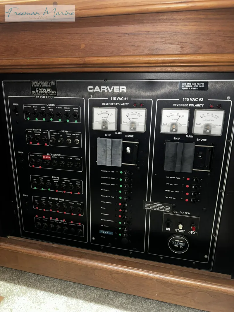 Slide: The Image of Electrical panel of 1988 Carver 4207 Aft Cabin boat with switches and meters. - 28