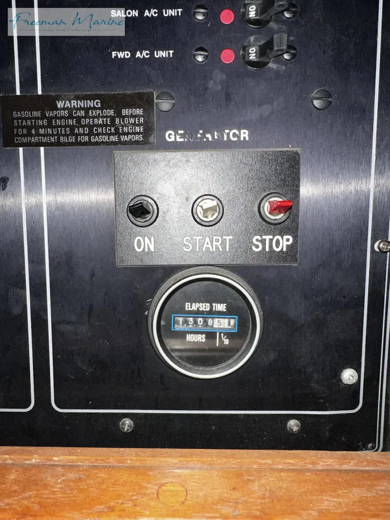 Slide: The Image of Control panel of a 1988 Carver 4207 Aft Cabin generator with elapsed time display. - 29