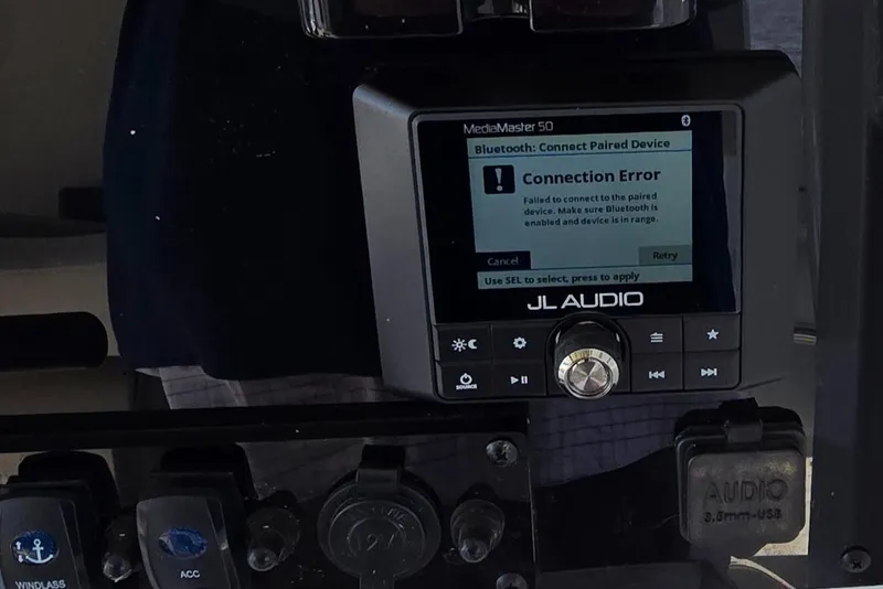 Slide: The Image of JL Audio MediaMaster 50 on 2023 Sea Hunt Escape 250 showing Bluetooth connection error. - 13