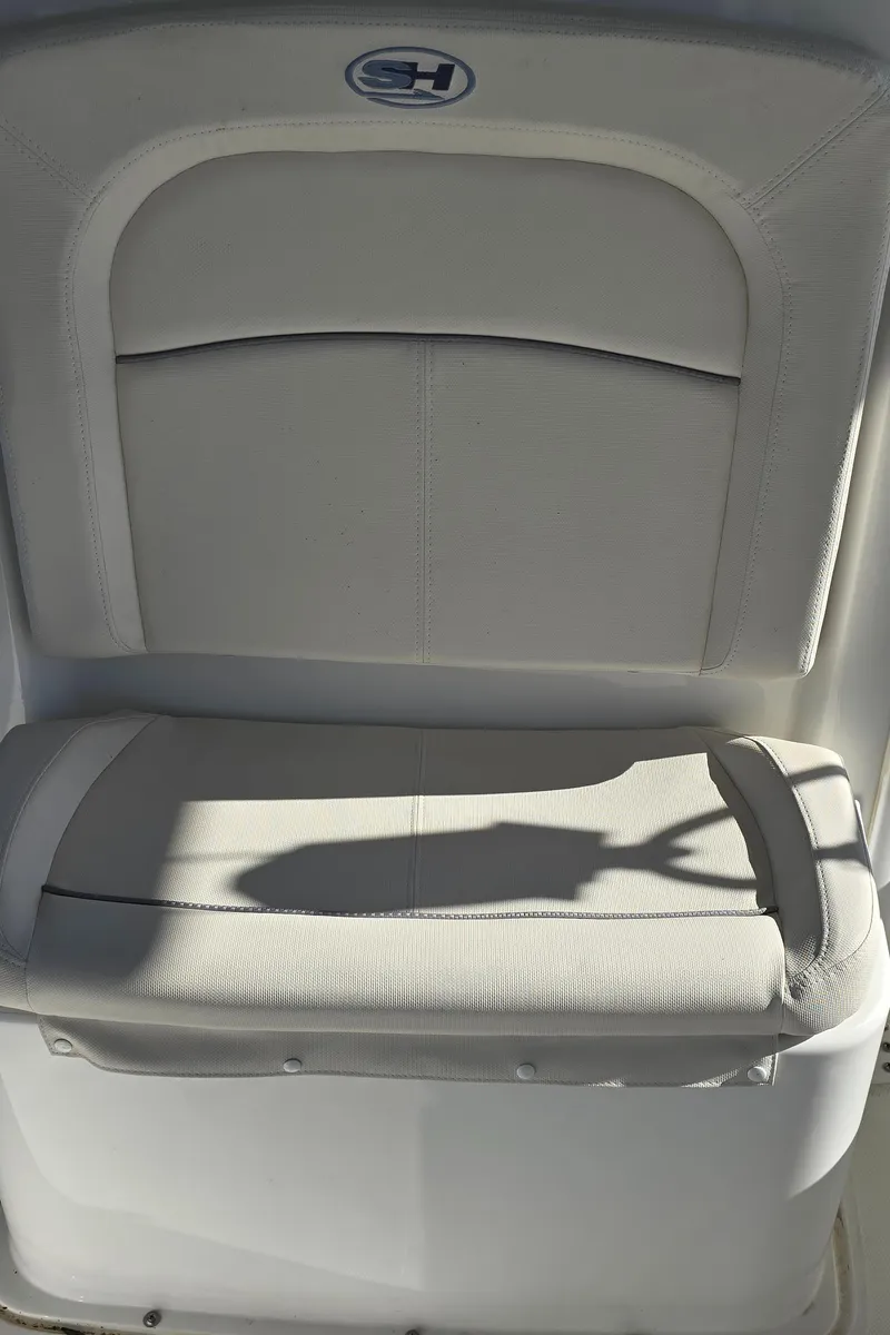 Slide: The Image of 2023 Sea Hunt Escape 250 boat seat with white upholstery. - 22