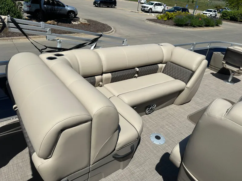 Slide: The Image of 2024 Sun Tracker Fishin' Barge 22 XP3 pontoon boat with beige seating. - 4